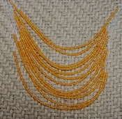 Light orange 12 strand necklace 18" with seed beads nk69