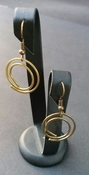 Gold colored round single swirl spiral dangle fishhook earrings