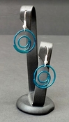 Blue colored round single swirl spiral dangle fishhook earrings